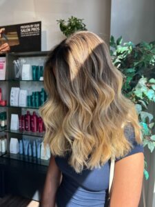Dimensional brunette hair color created at Savoye Salon Spa