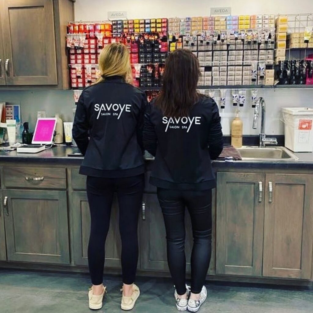 consultation between a guest and stylist at Savoye Salon Spa